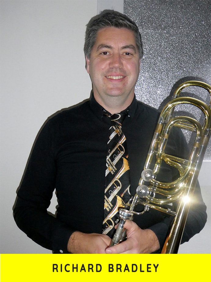 Richard Bradley holding a trombone